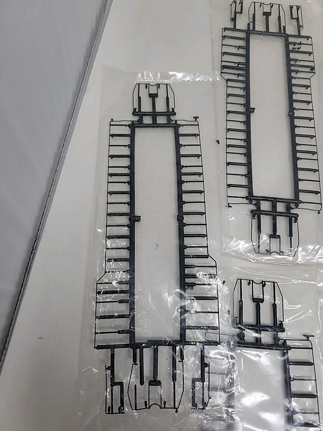 Lot of 13 HO Scale Locomotive Handrail Kits, Brand Unknown