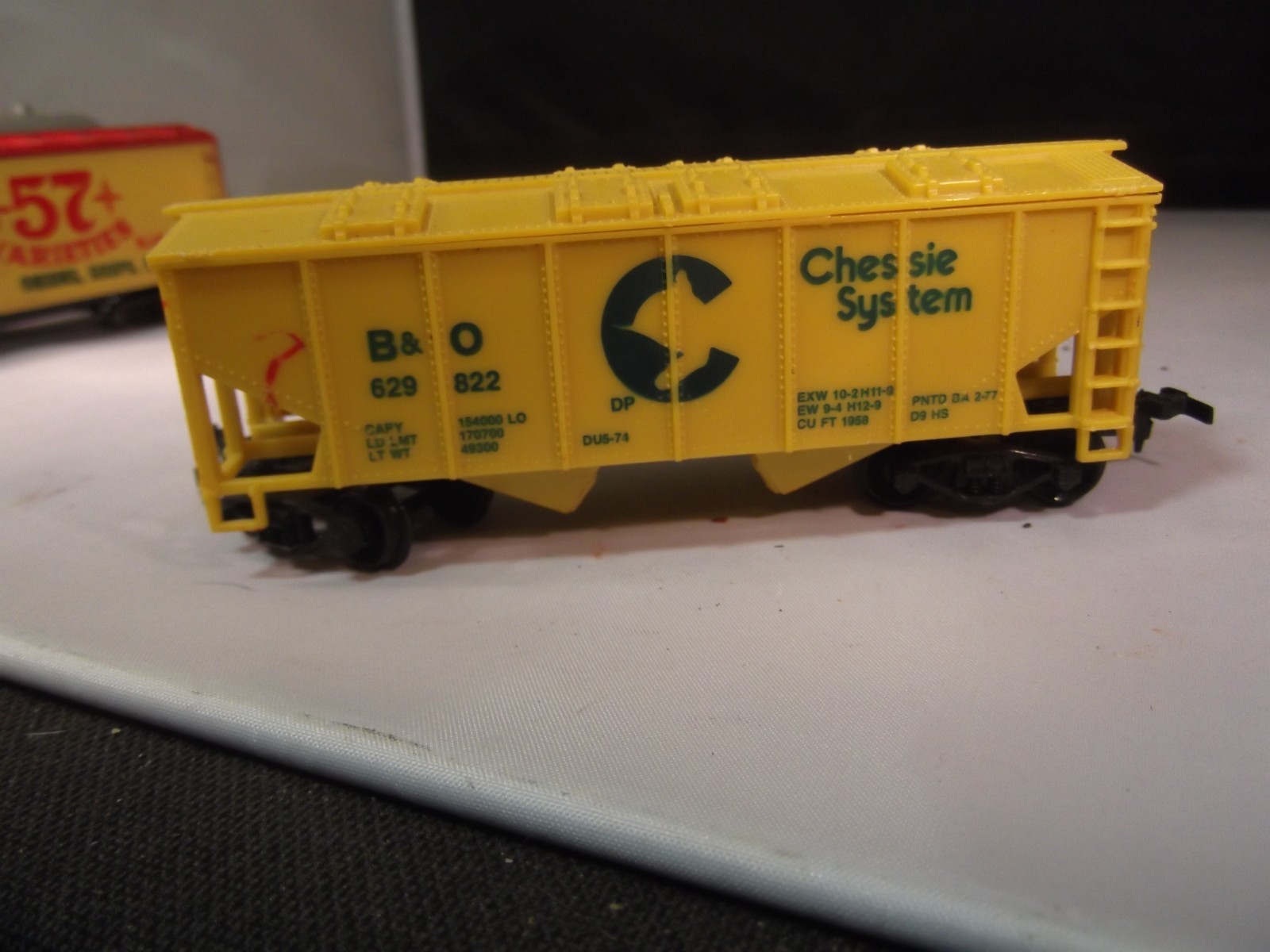 Lot of HO Scale Diesel Locomotive Lot of 2 + Box Cars and a Caboose as is