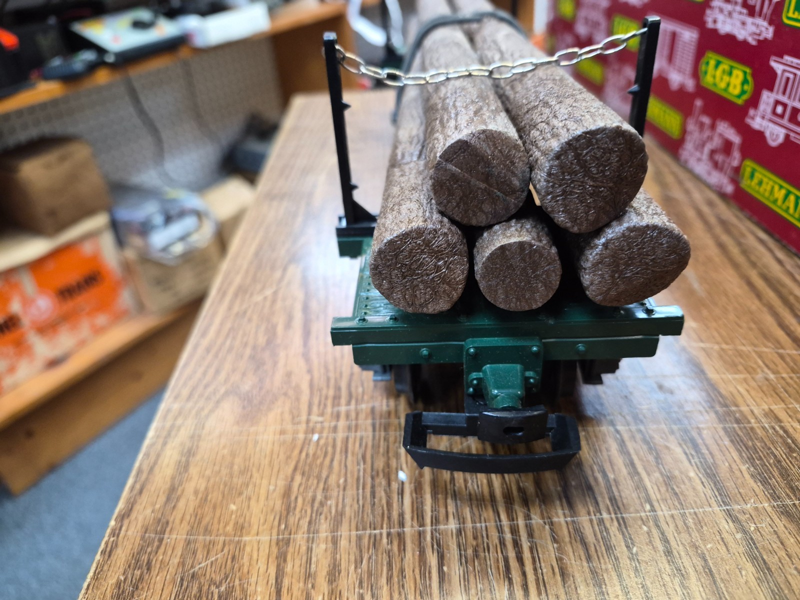 LGB 4066 LOG CAR WITH LOGS, STAKES, CHAINS , SPRING TIE DOWNS G SCALE PRE OWNED