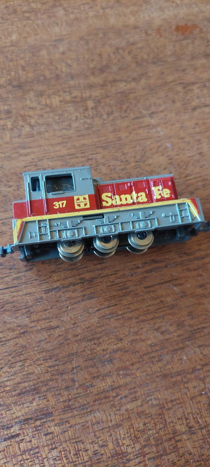 n scale Santa Fe Diesel Switcher Locomotive Red/silver/ yellow. runs perfectly.
