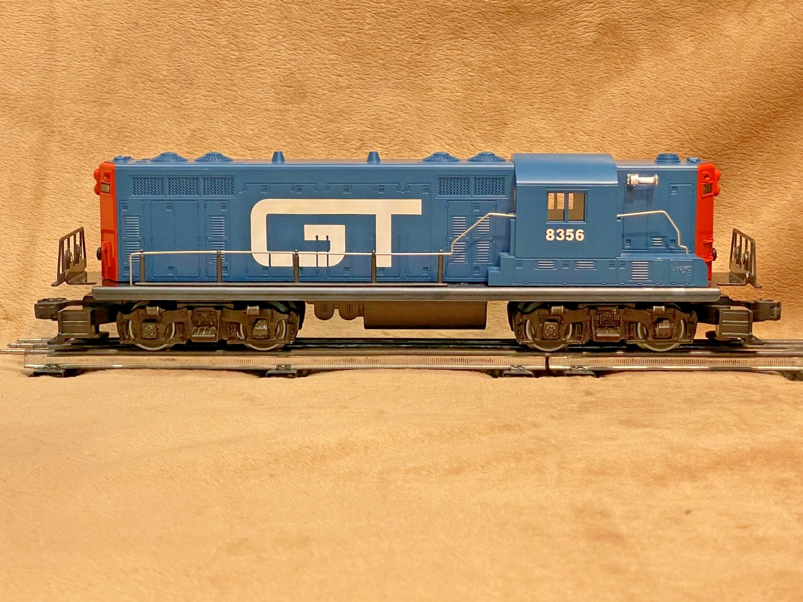Lionel modern Grand Trunk coal train! Four 9822 gondolas plus 8356 dummy GP-7