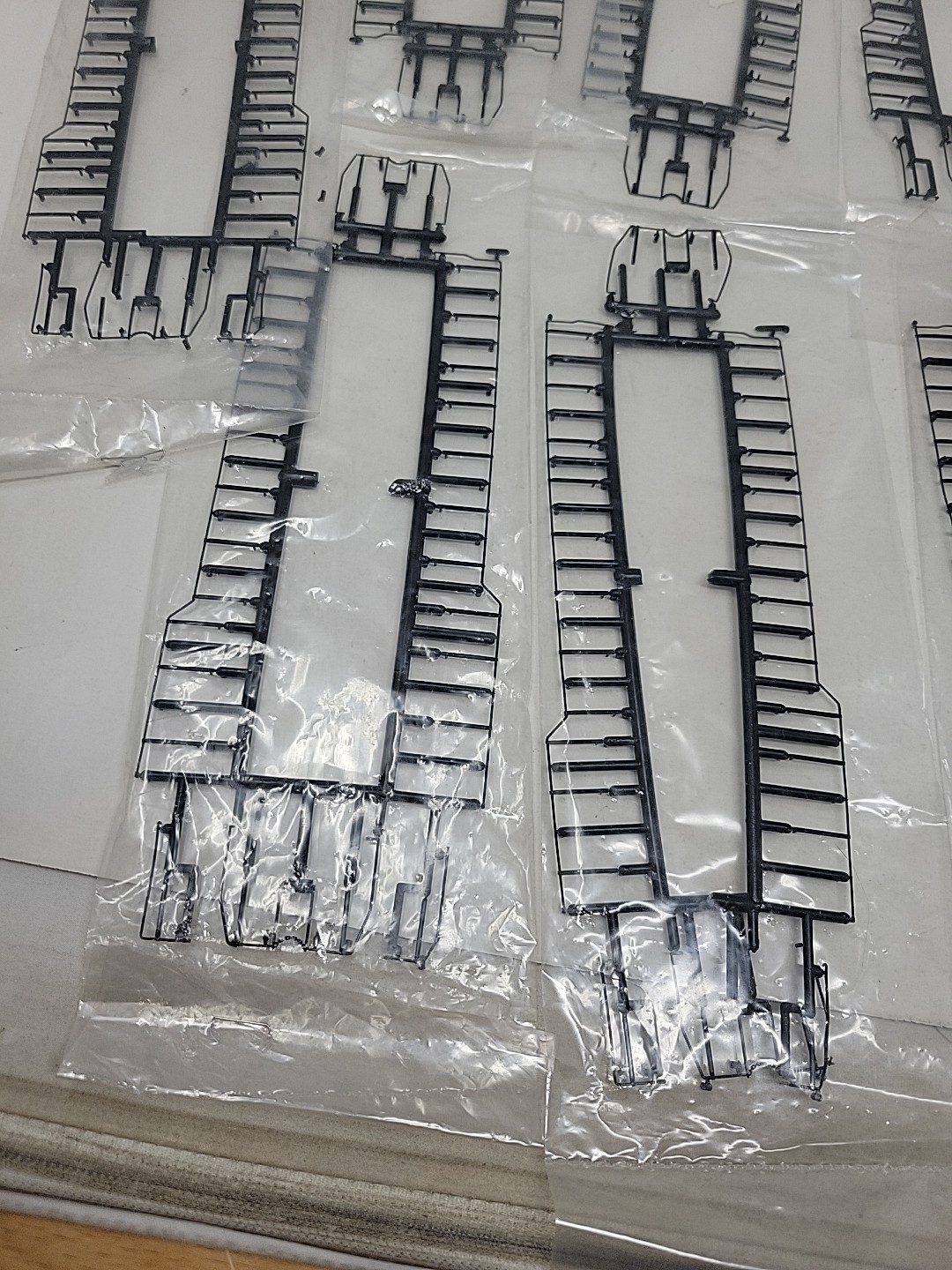 Lot of 13 HO Scale Locomotive Handrail Kits, Brand Unknown