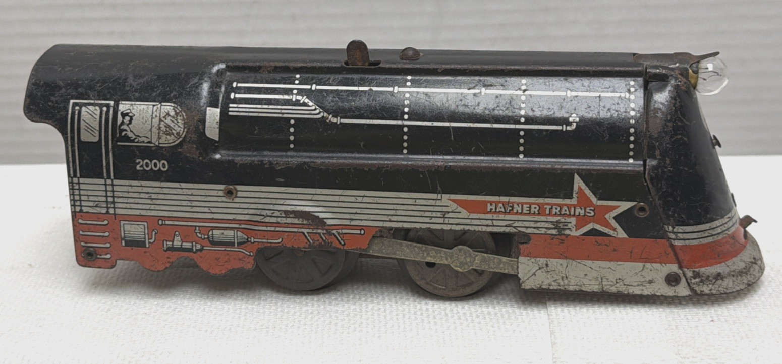 VINTAGE HAFNER O-GAUGE 2000 WIND-UP LOCOMOTIVE. WORKING FINE WITH BELL RINGING.