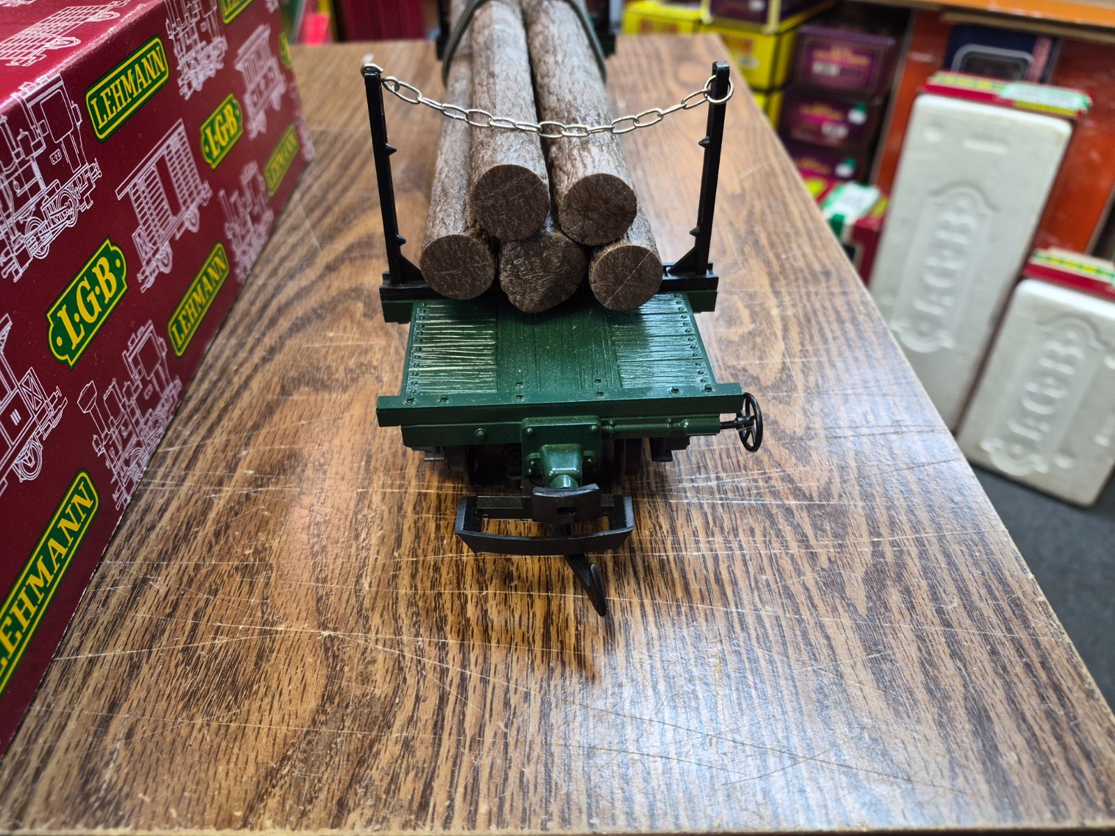 LGB 4066 LOG CAR WITH LOGS, STAKES, CHAINS , SPRING TIE DOWNS G SCALE PRE OWNED
