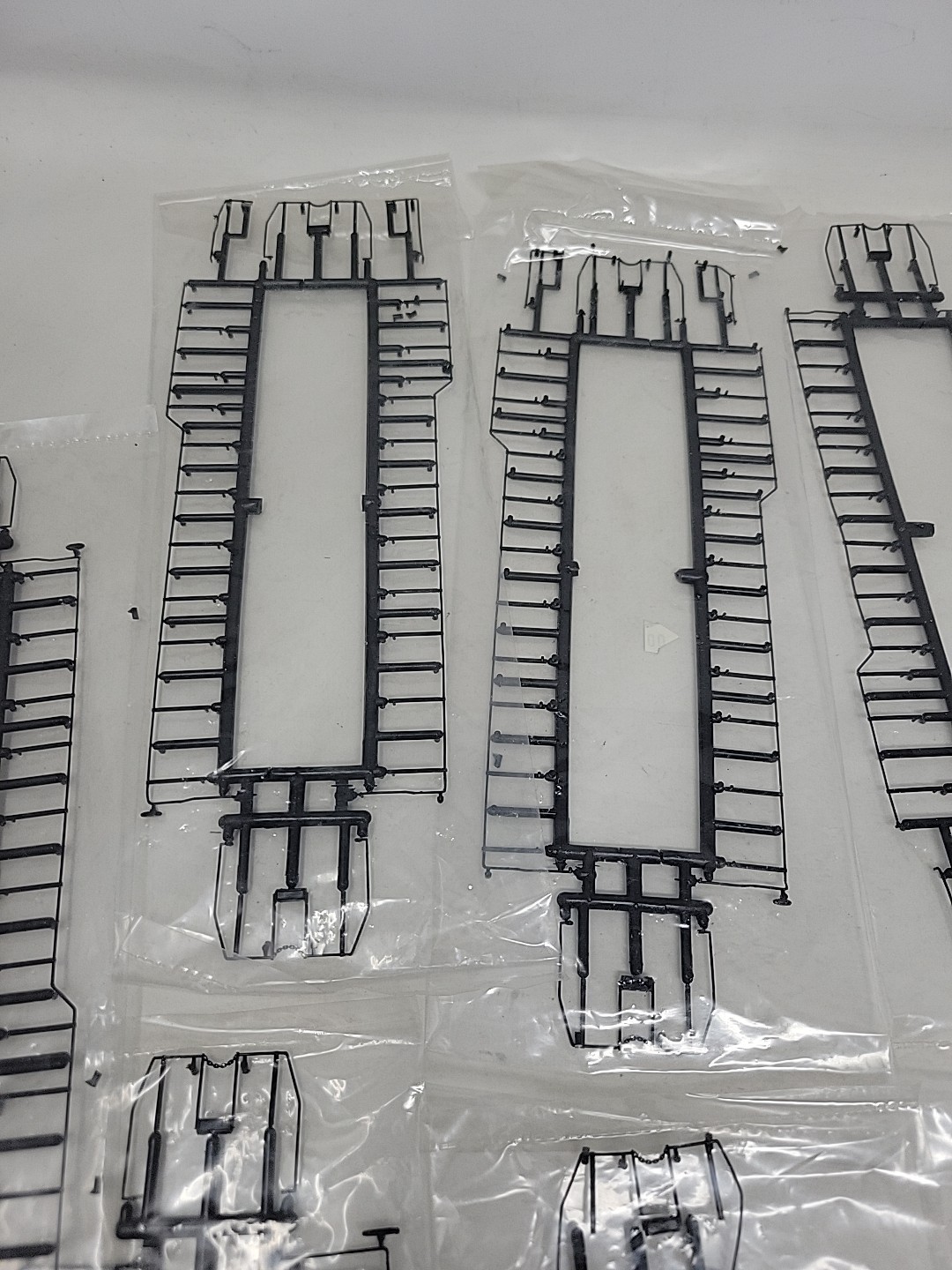 Lot of 13 HO Scale Locomotive Handrail Kits, Brand Unknown