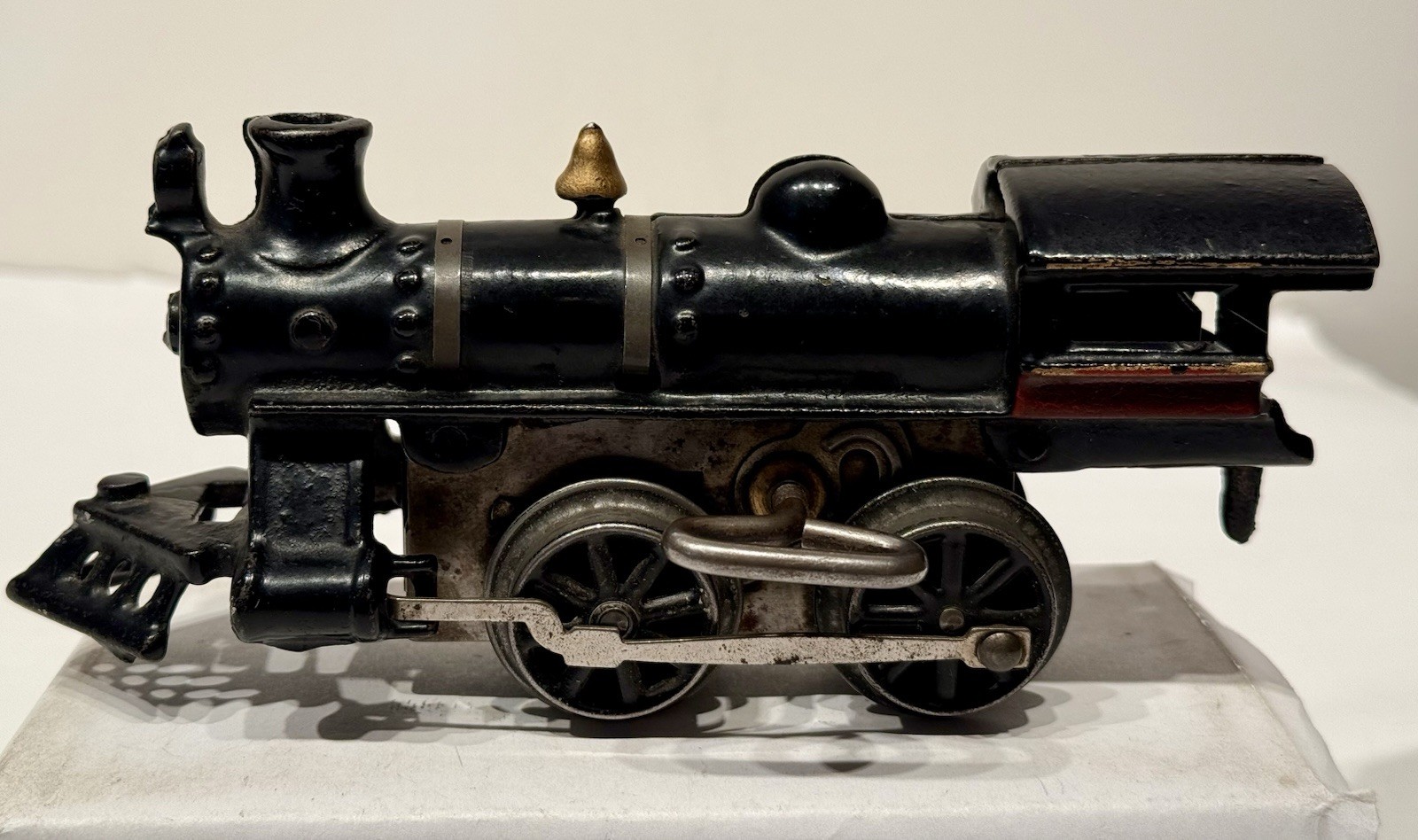 Hafner 112 Cast Iron Windup Loco with Open Spoked Stamped-Metal Drive Wheels