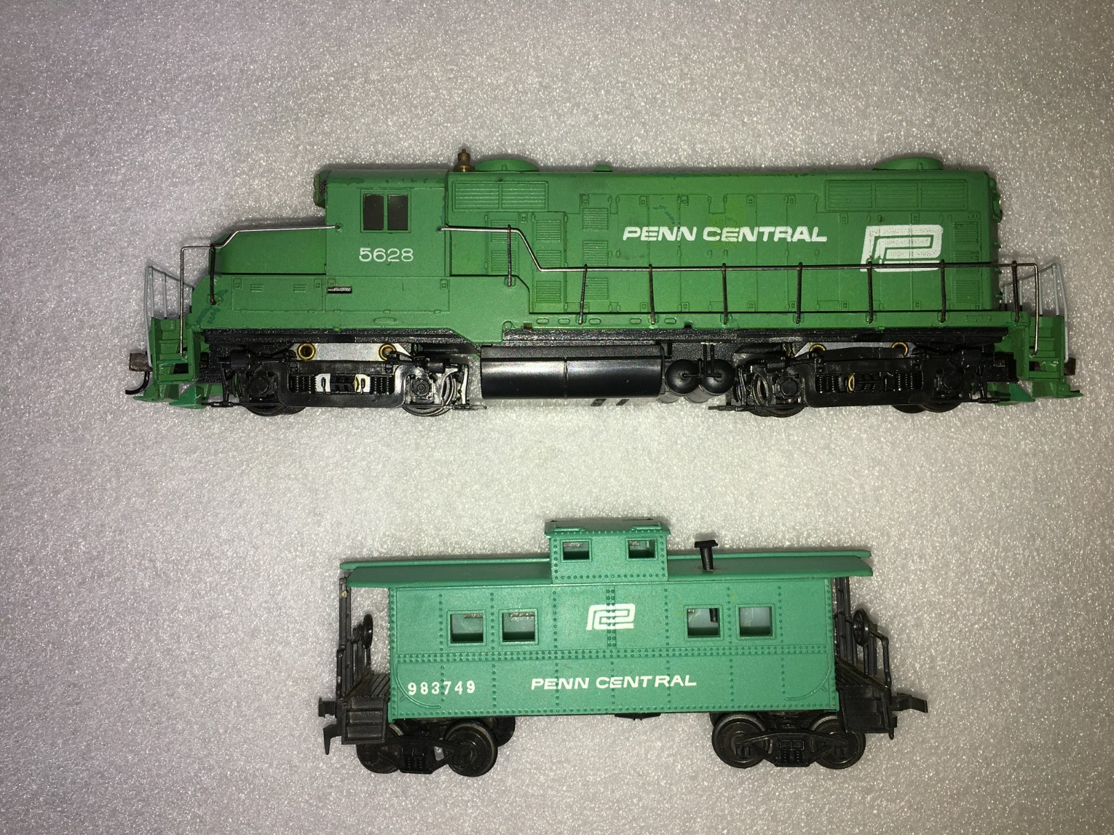 HO TYCO Penn Central GP20 shell with a Proto 2000 Chassis, Penn Central Caboose