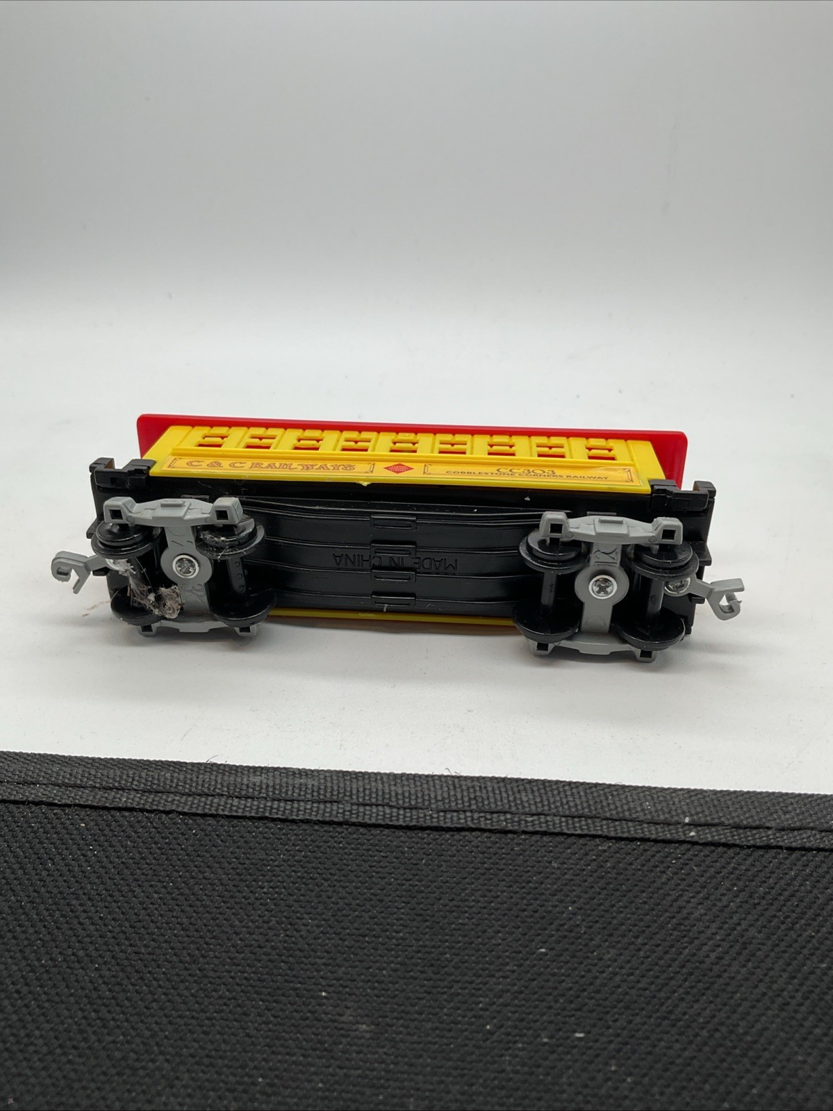 C&C Railways CC303 – HO Scale – Red & Yellow Train Car
