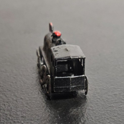 STEAM ENGINE LOCOMOTIVE, TRAIN. DIE CAST METAL, BLACK PAINTED. MARKED JAPAN