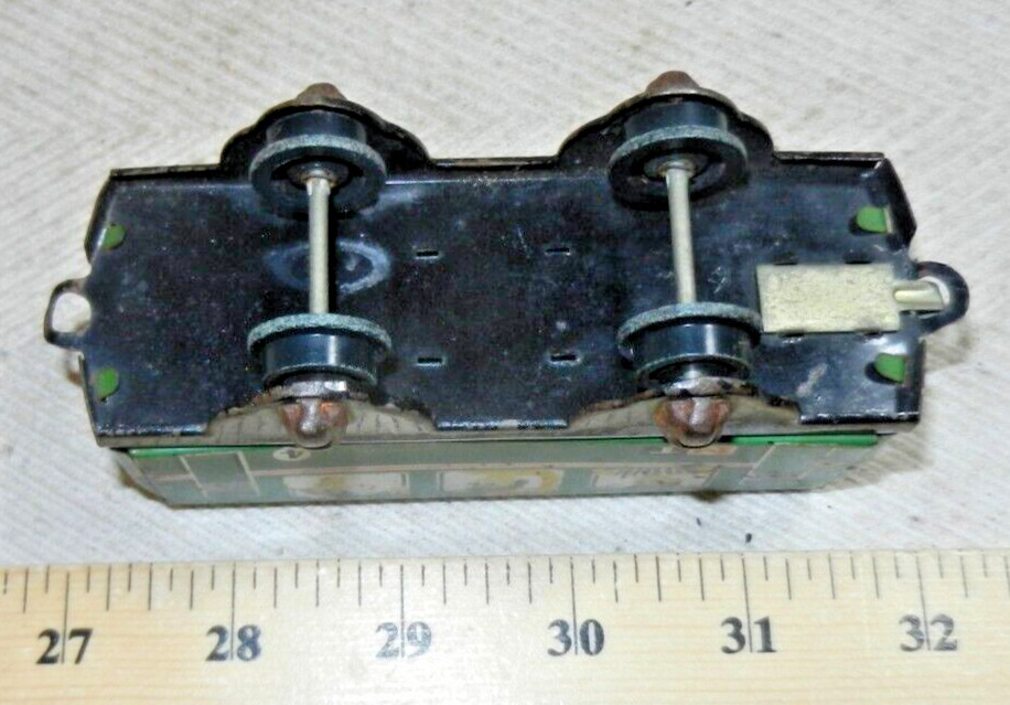 Older Tin Lithographed MT 4 Passenger Coach with plastic wheels – by who?