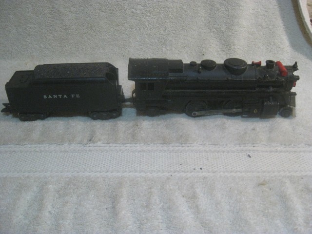Vintage MARX O-Scale # 666 Black Cast Metal 2-4-2 Steam Locomotive – TESTED