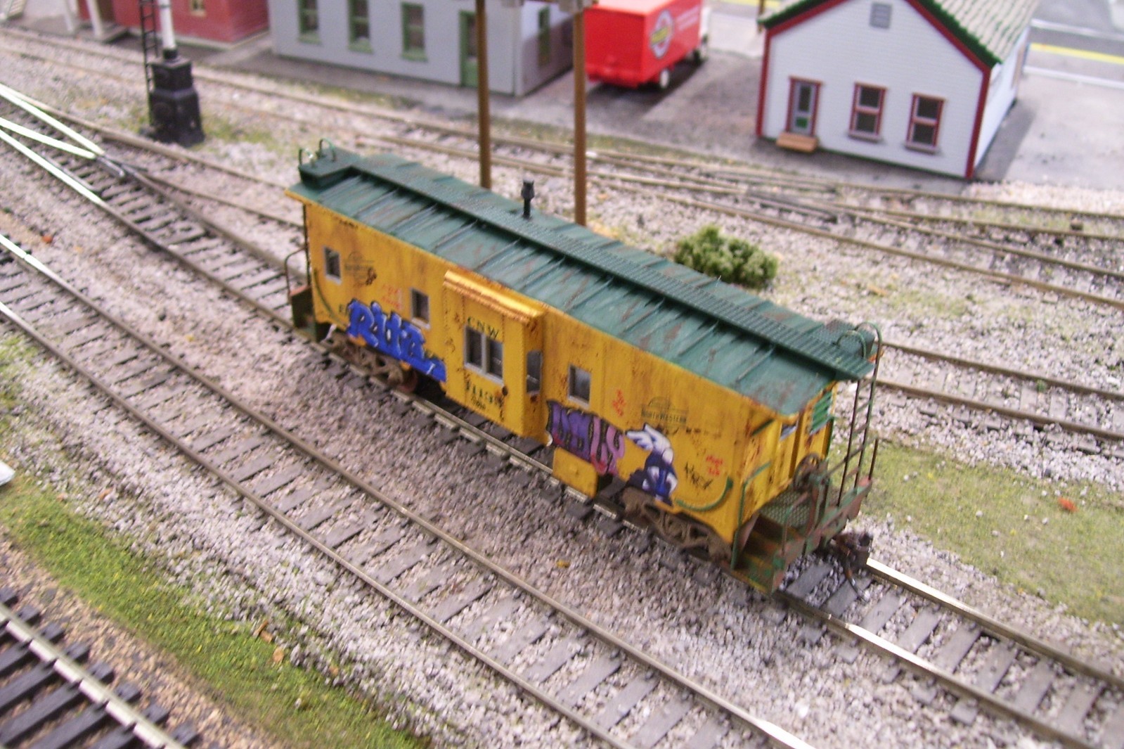 Custom Athearn Chicago &Northwestern bay window caboose.