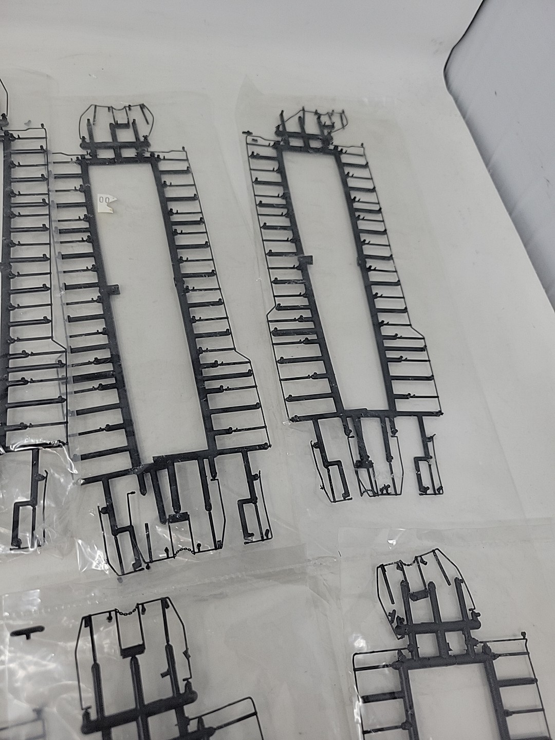 Lot of 13 HO Scale Locomotive Handrail Kits, Brand Unknown
