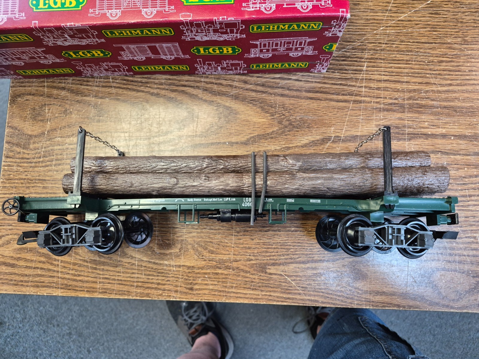 LGB 4066 LOG CAR WITH LOGS, STAKES, CHAINS , SPRING TIE DOWNS G SCALE PRE OWNED