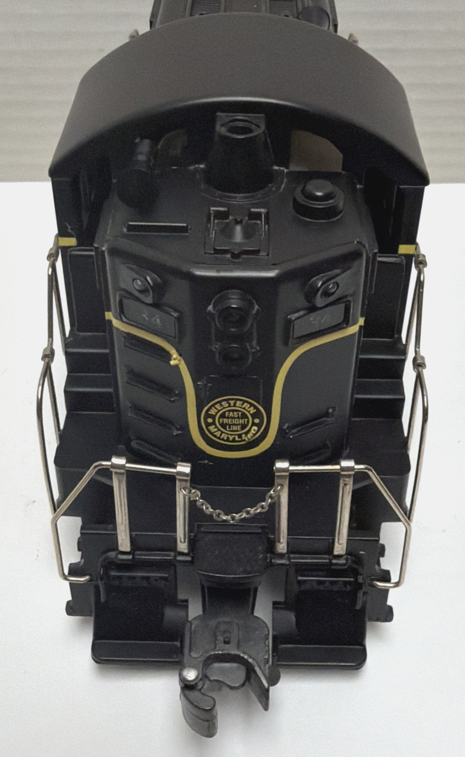 RMT-4342 WESTERN MARYLAND #34 BEEP POWERED DIESEL LOCOMOTIVE O/027. NO BOX.