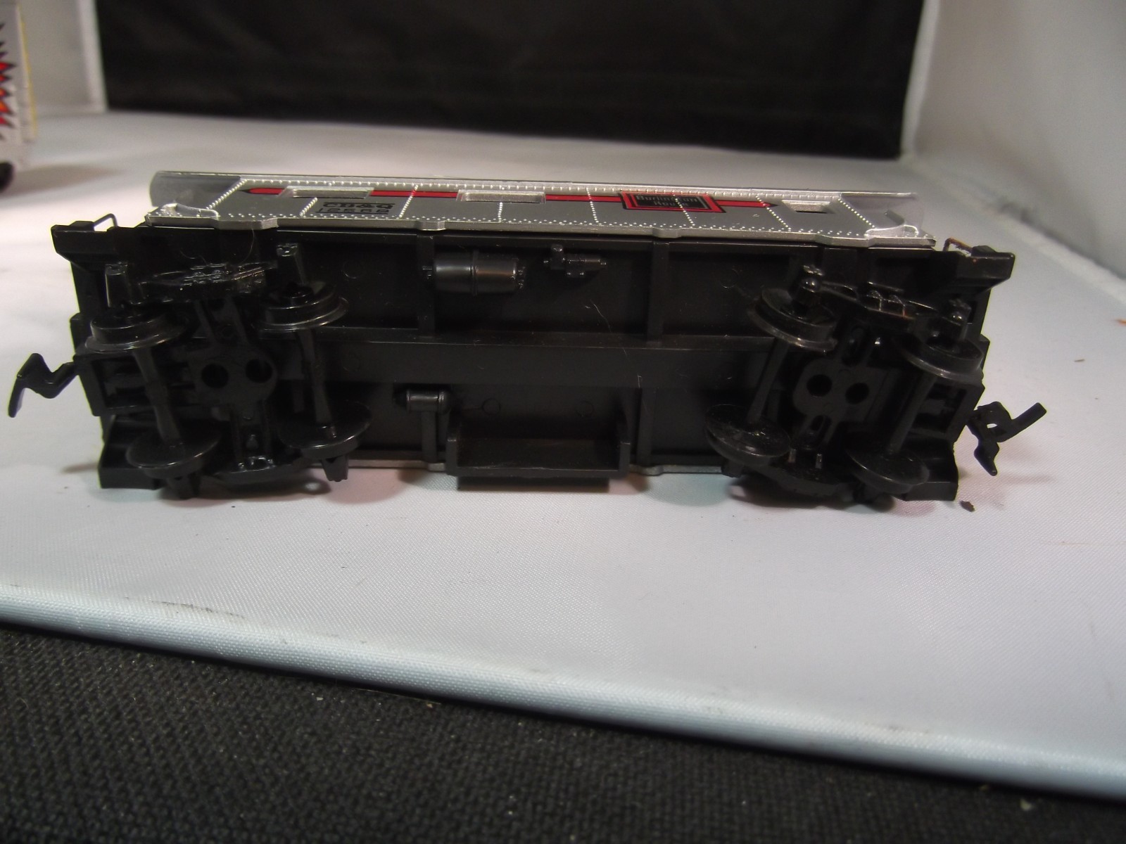 Lot of HO Scale Diesel Locomotive Lot of 2 + Box Cars and a Caboose as is