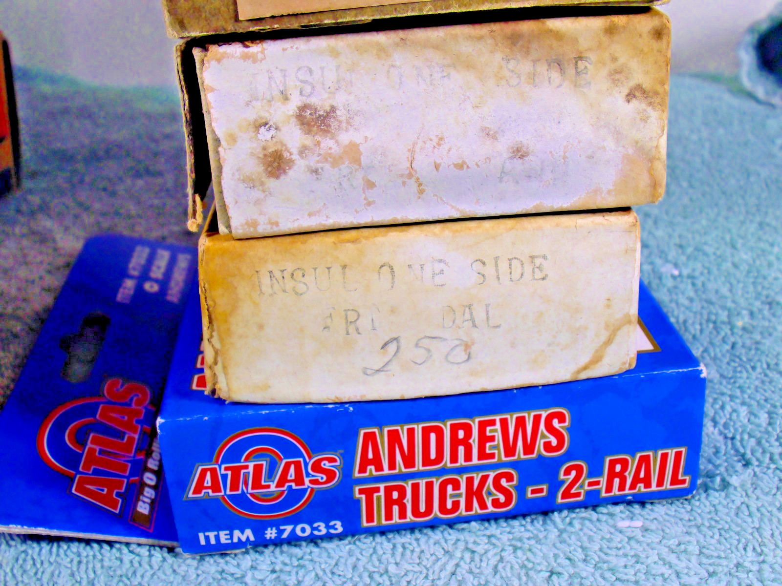 4 Pairs of O Scale Trucks, 3 are Auel, and 1 is Atlas, 2 rail new old stock.