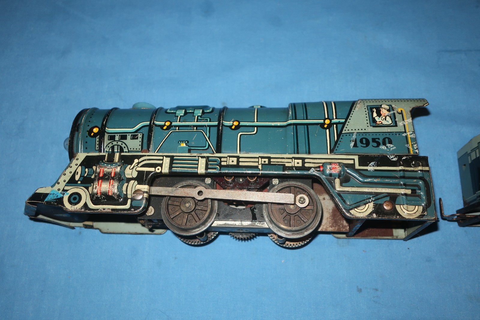 Unique Art Lines #1950 Tin Litho Steam Locomotive and Tender. Runs well