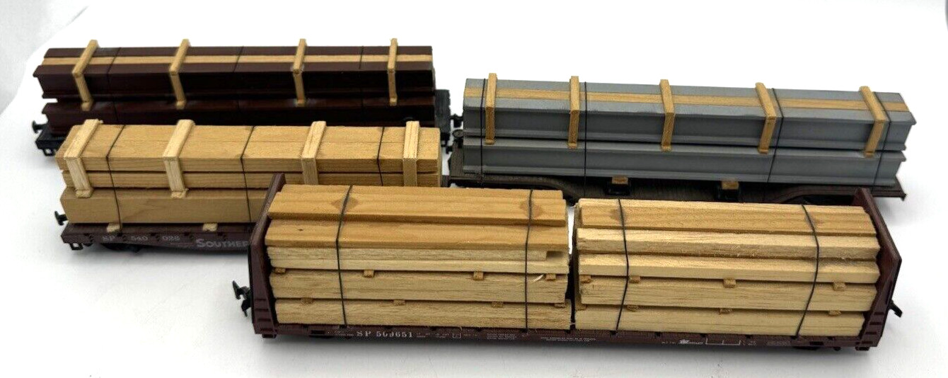 LOT OF 4 DIFFERENT HO GAUGE MODEL RAILROAD S P WOOD CARRIER CARS WITH LOADS