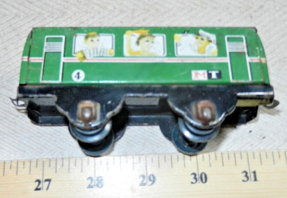 Older Tin Lithographed MT 4 Passenger Coach with plastic wheels – by who?