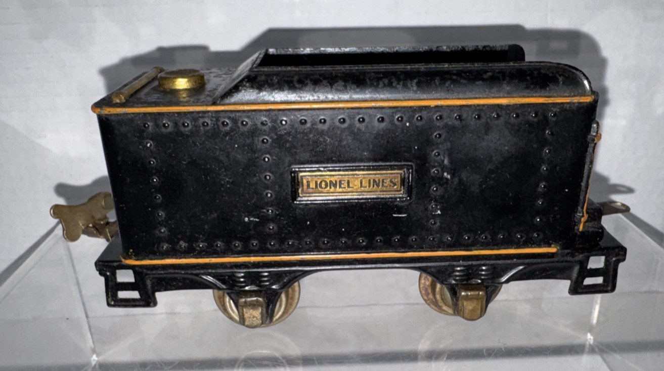 LIONEL PREWAR O GAUGE 257T TIN BLACK W/ORANGE STRIP TENDER