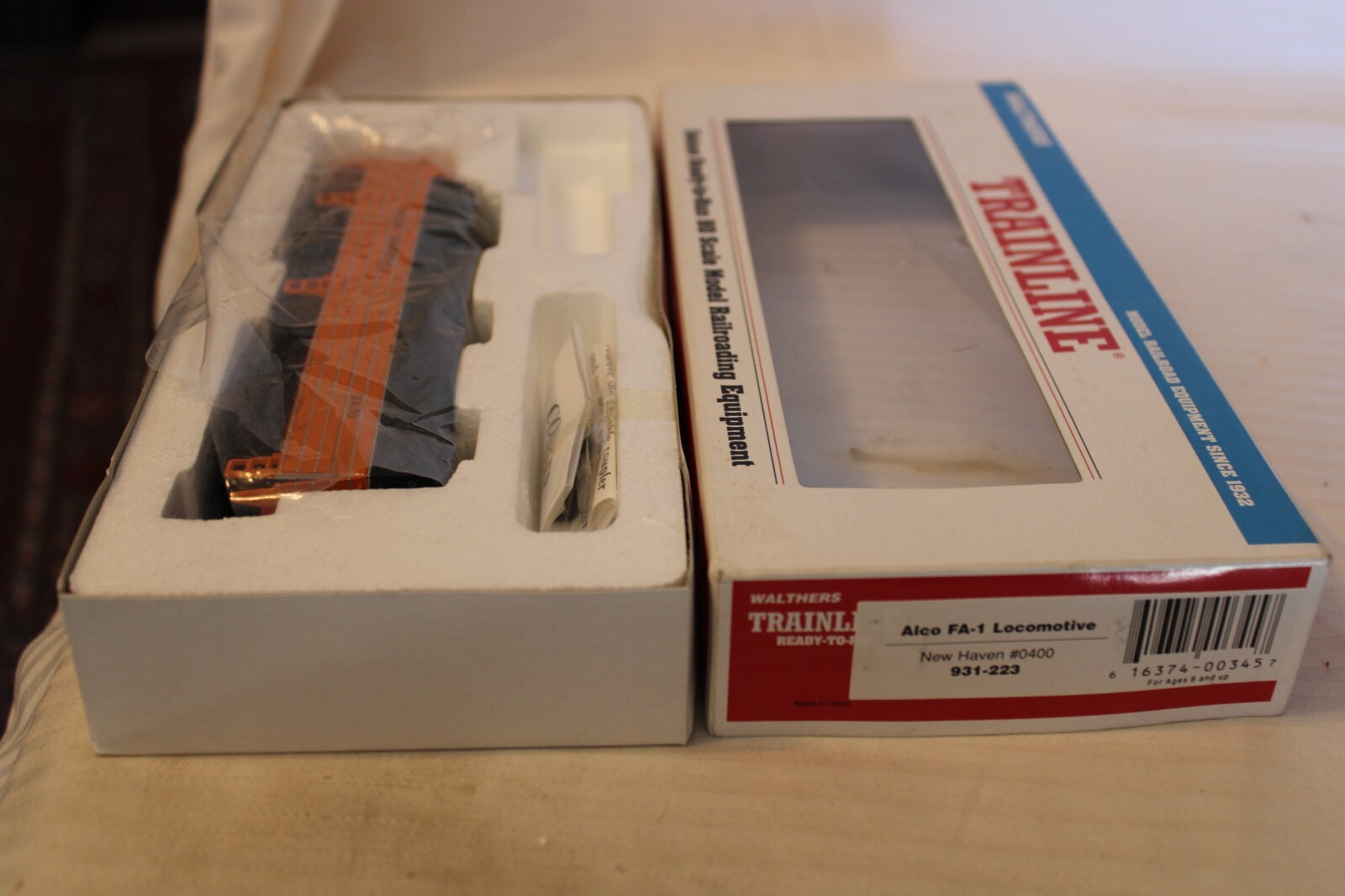 HO Scale Walthers, Alco FA-1 Diesel Locomotive, New Haven Orange #0400 – 931-223