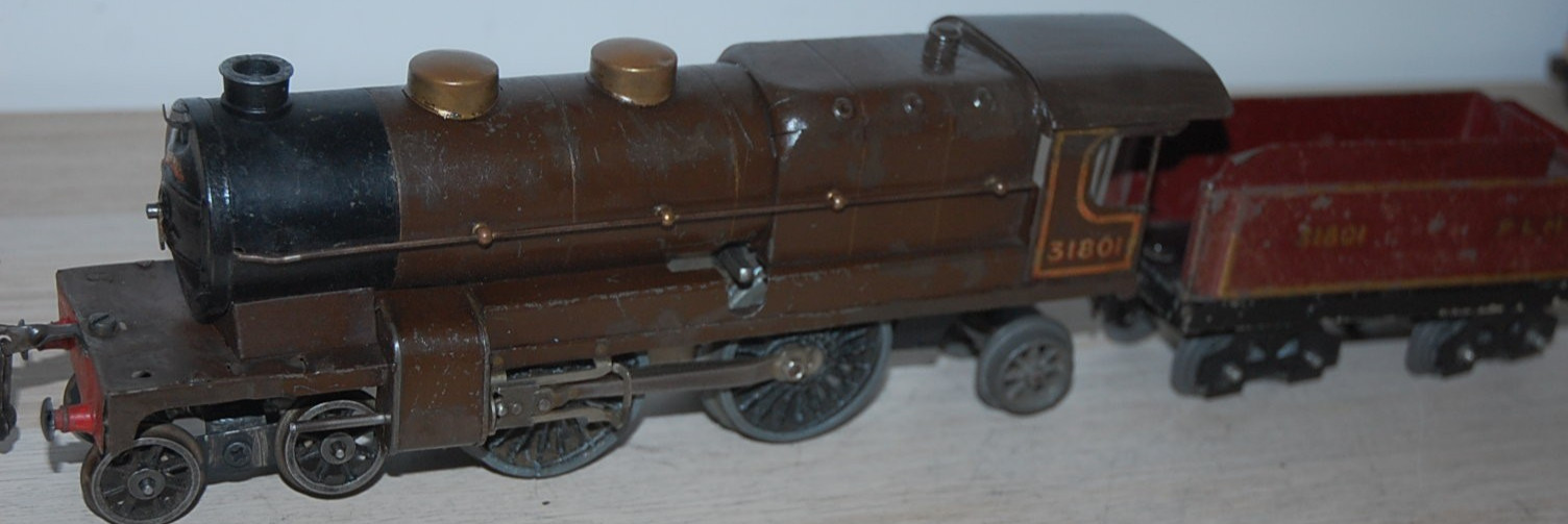 HORNBY O GAUGE CLOCKWORK ‘NORD’ LOCOMOTIVE AND TENDER IN BROWN LIVERY