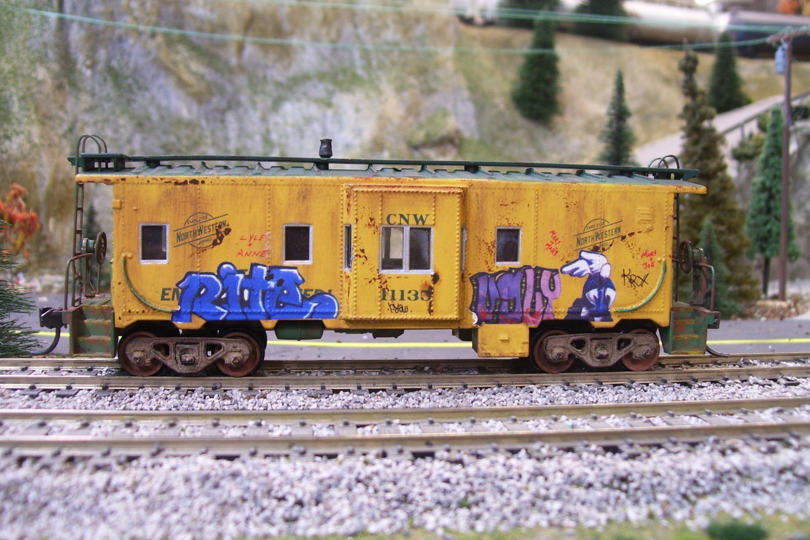 Custom Athearn Chicago &Northwestern bay window caboose.