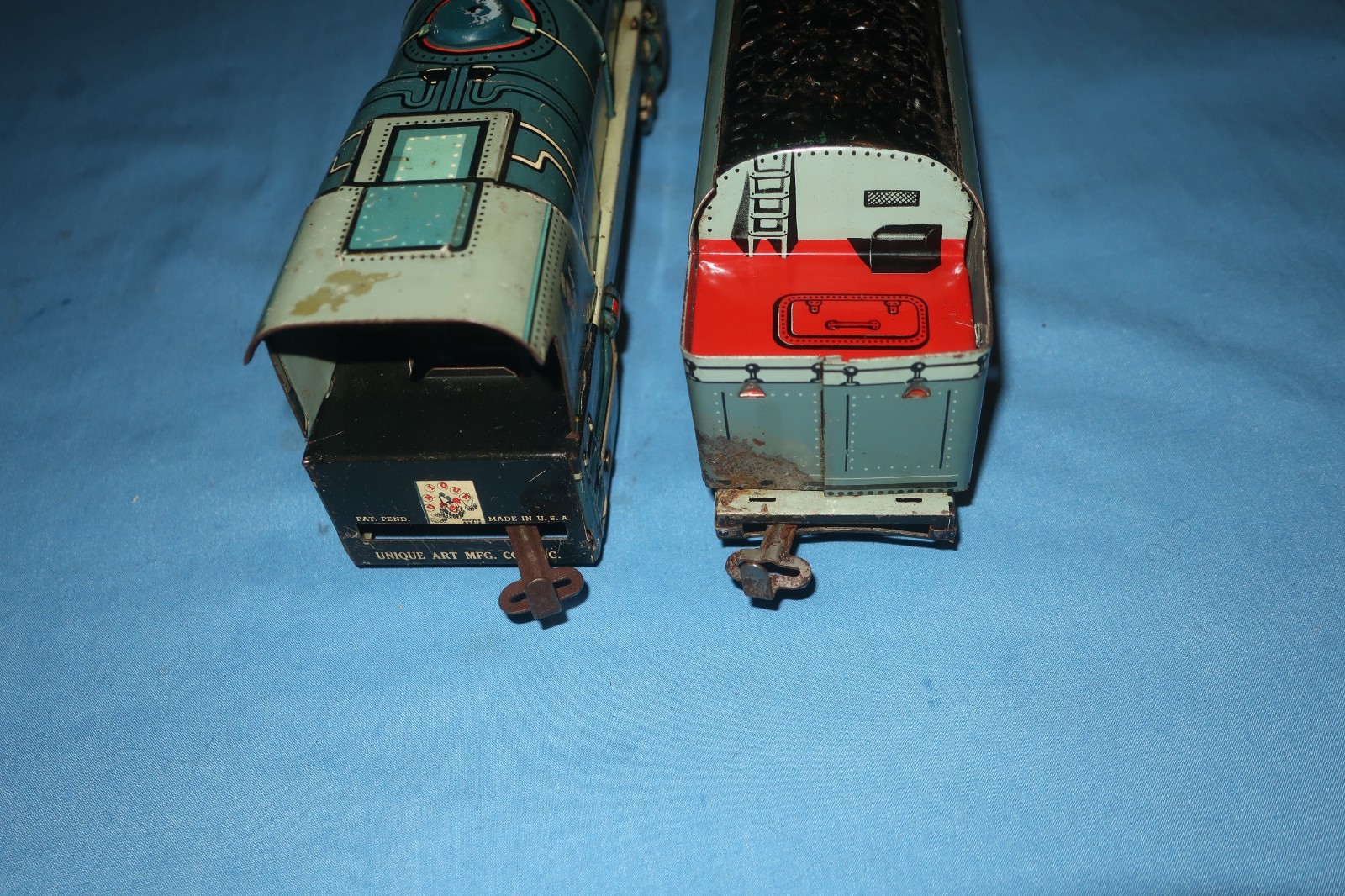 Unique Art Lines #1950 Tin Litho Steam Locomotive and Tender. Runs well