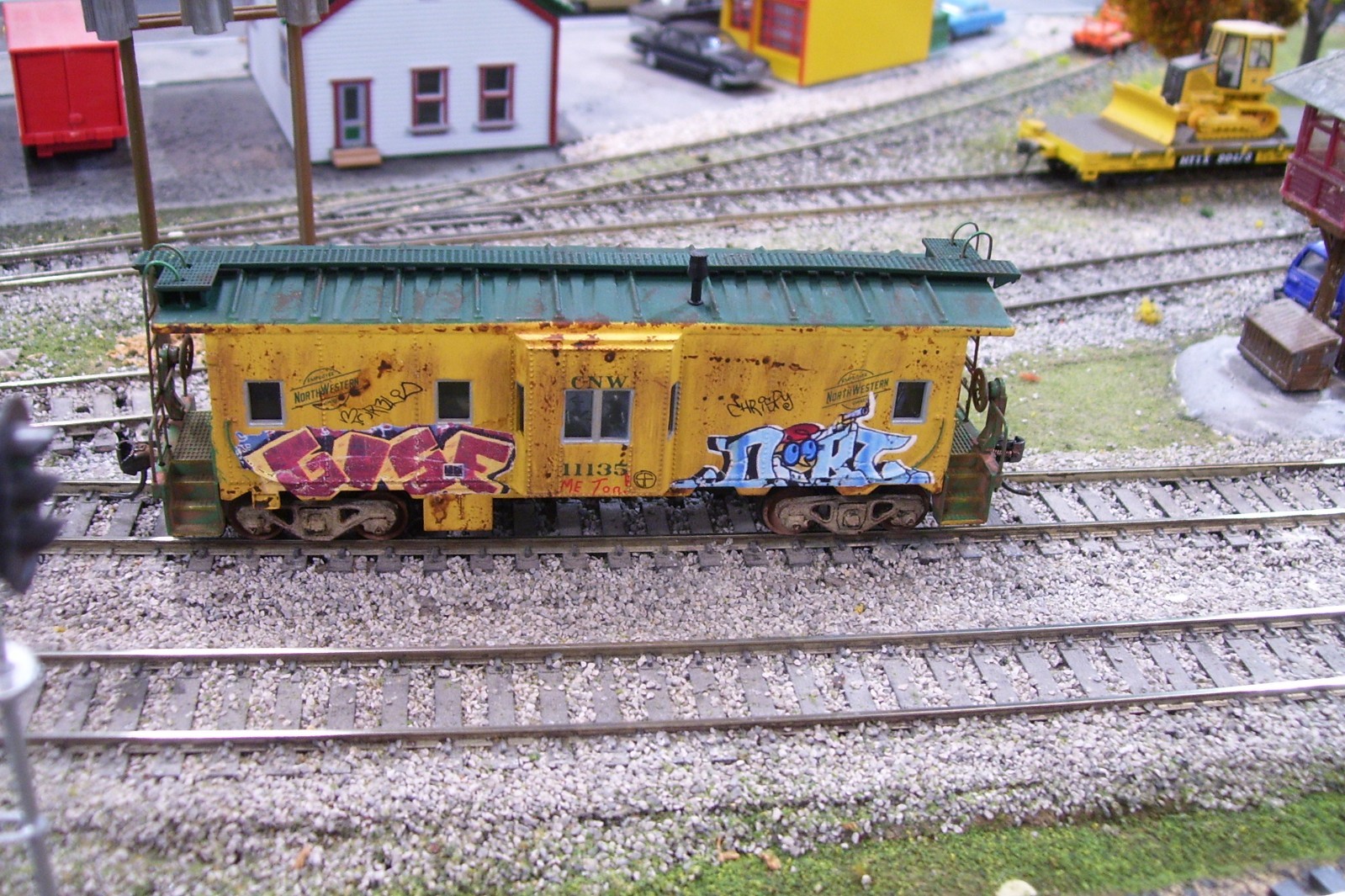 Custom Athearn Chicago &Northwestern bay window caboose.