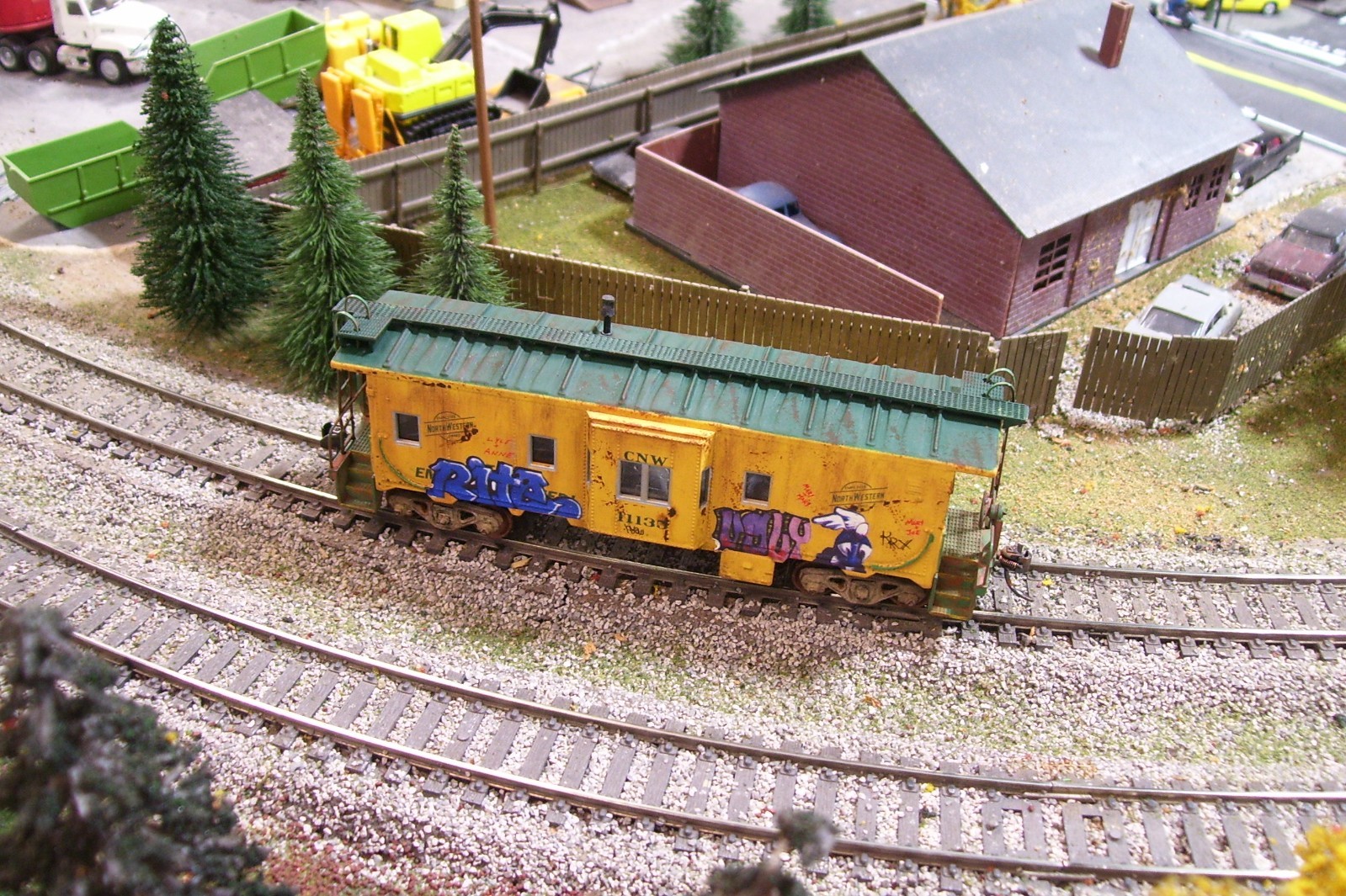 Custom Athearn Chicago &Northwestern bay window caboose.