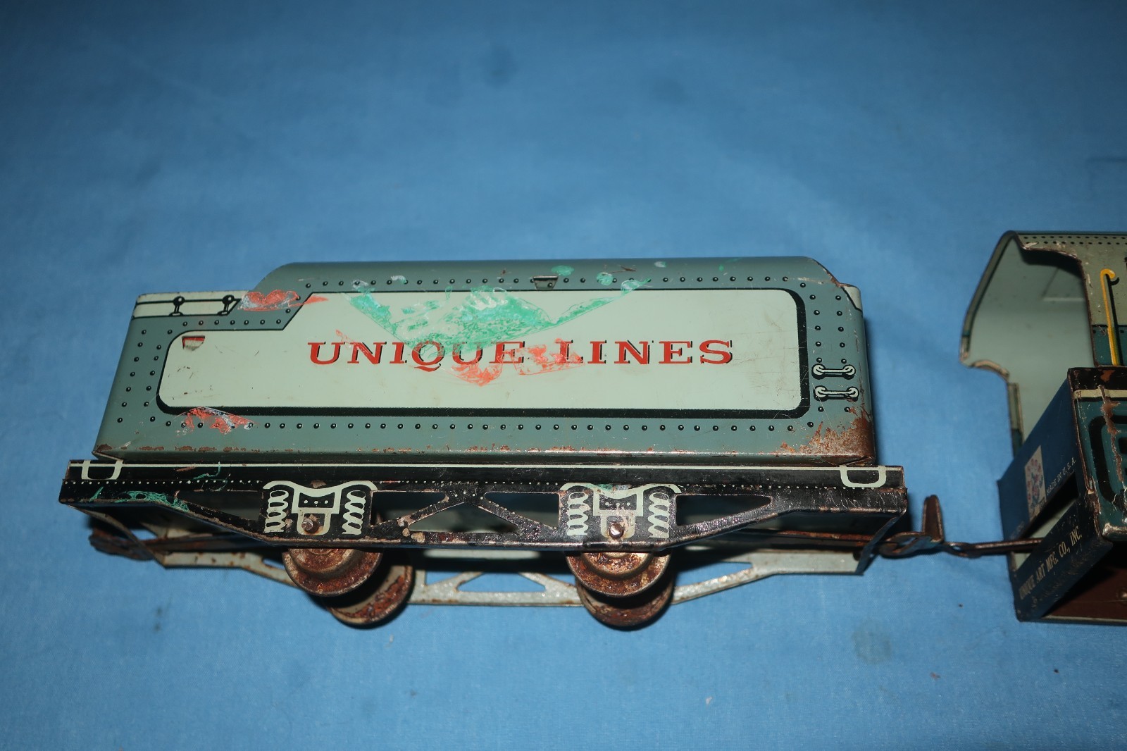 Unique Art Lines #1950 Tin Litho Steam Locomotive and Tender. Runs well