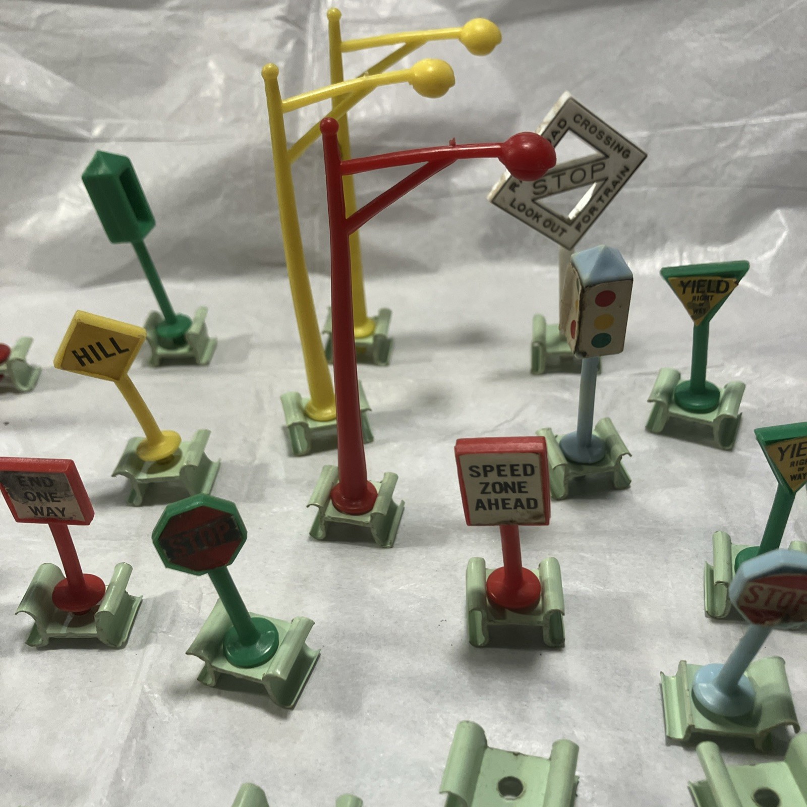 Vintage HO Scale Assorted RR & Traffic Signs, Light Posts And Extra Holders