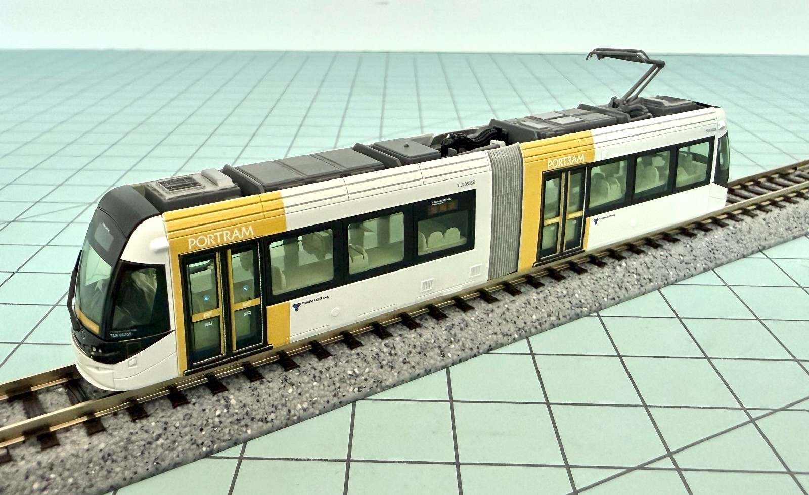 Kato 14-801-6 Toyama Light Rail Tram Portram TLR0603 (White and Yellow)