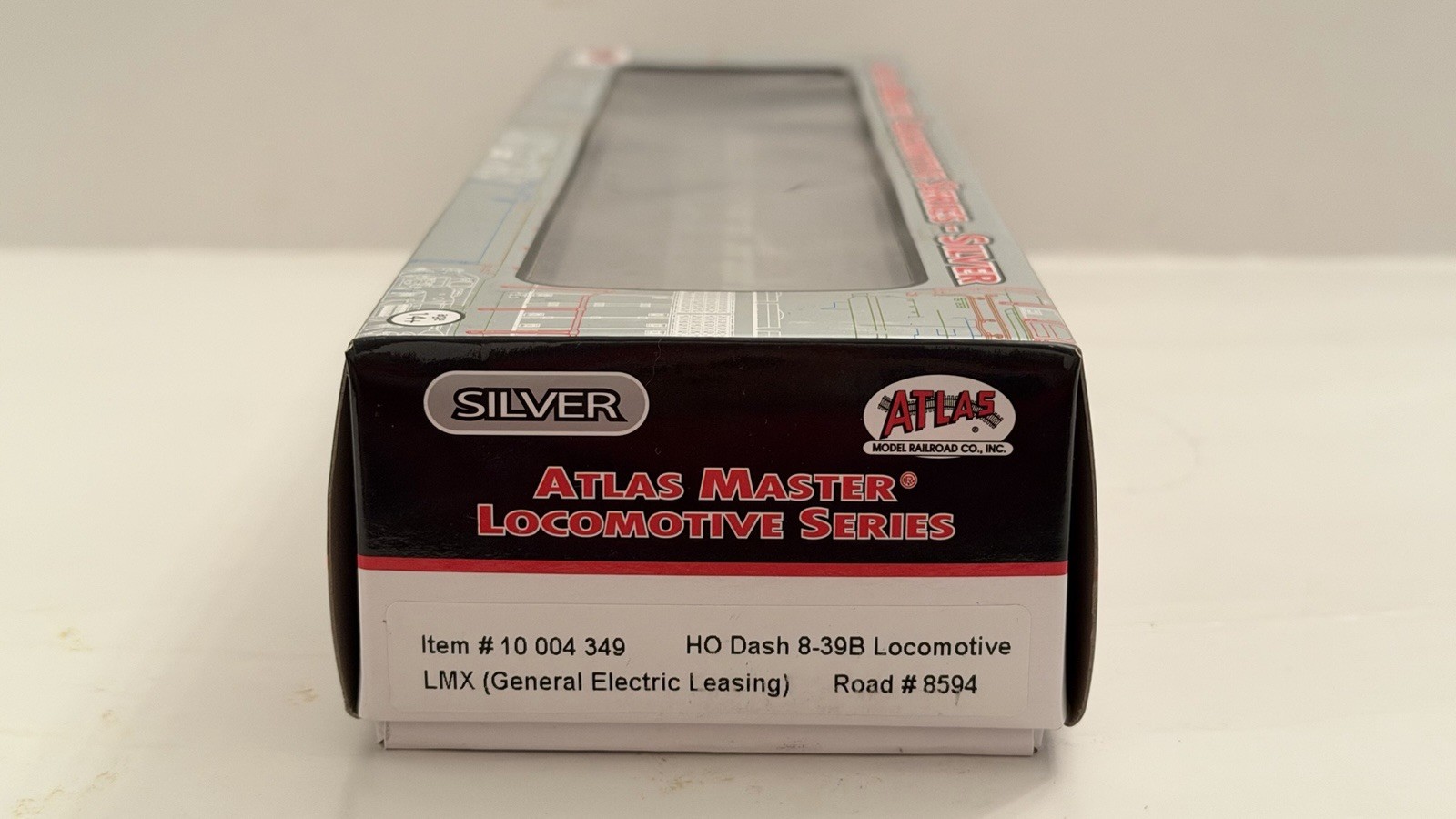 Atlas Silver HO 10004349 Dash 8-39B Loco LMX General Electric Leasing #8594