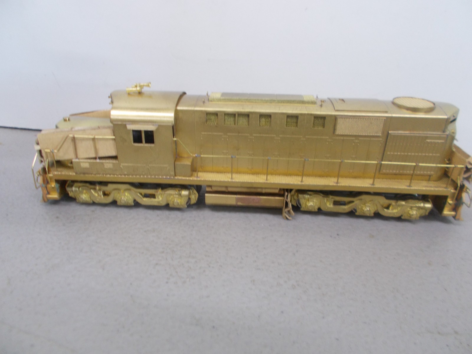 ALCO # D-124L ~ BRASS~ DL-702 POWERED LOCOMOTIVE ~NOS-RUNS GOOD~HO SCALE~LOT-B