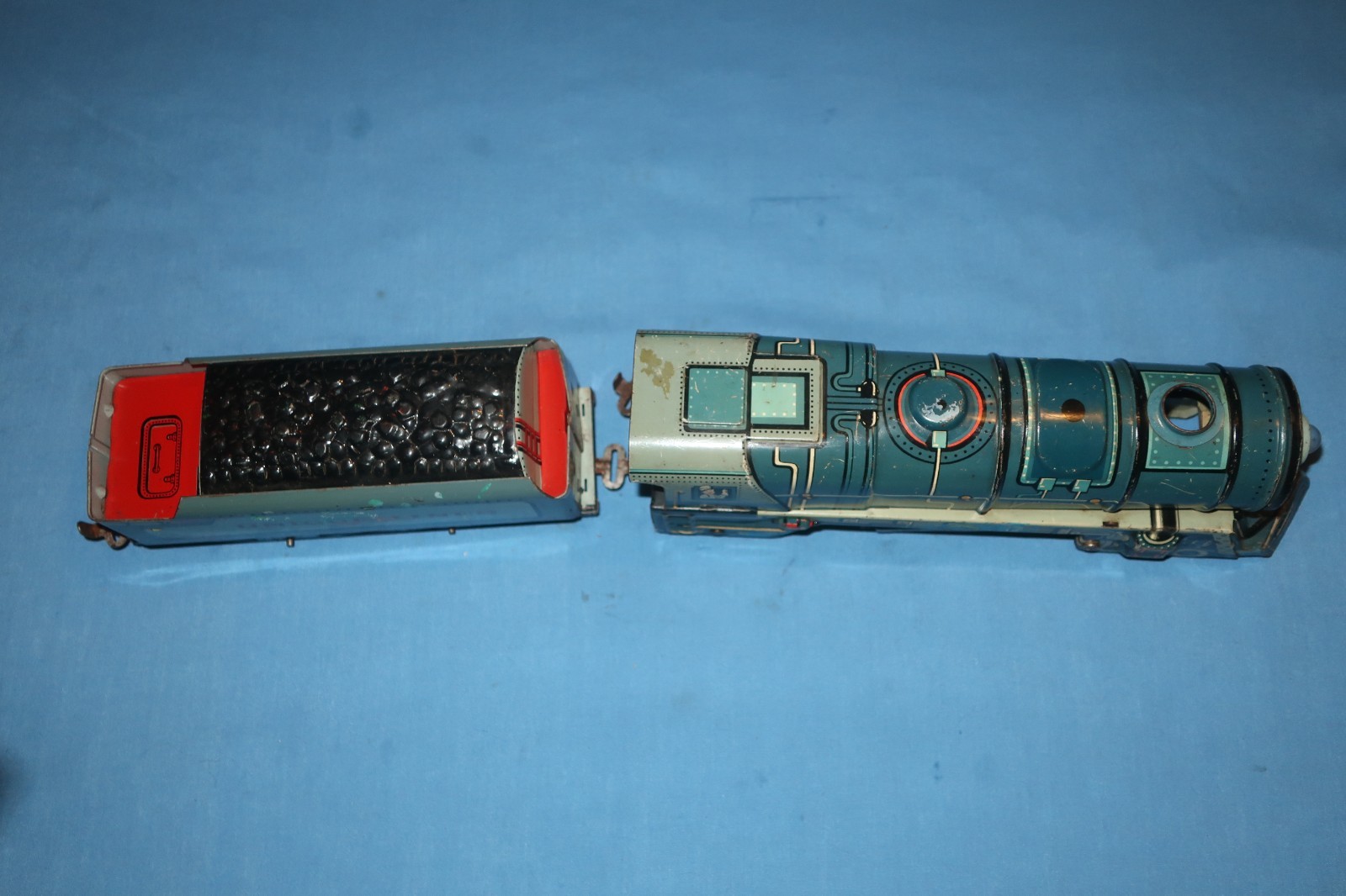 Unique Art Lines #1950 Tin Litho Steam Locomotive and Tender. Runs well