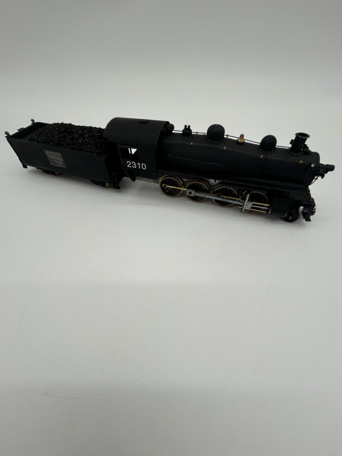 Unbranded Boston/Maine 2-8-0 Steam Locomotive W/tender, tested working HO gauge
