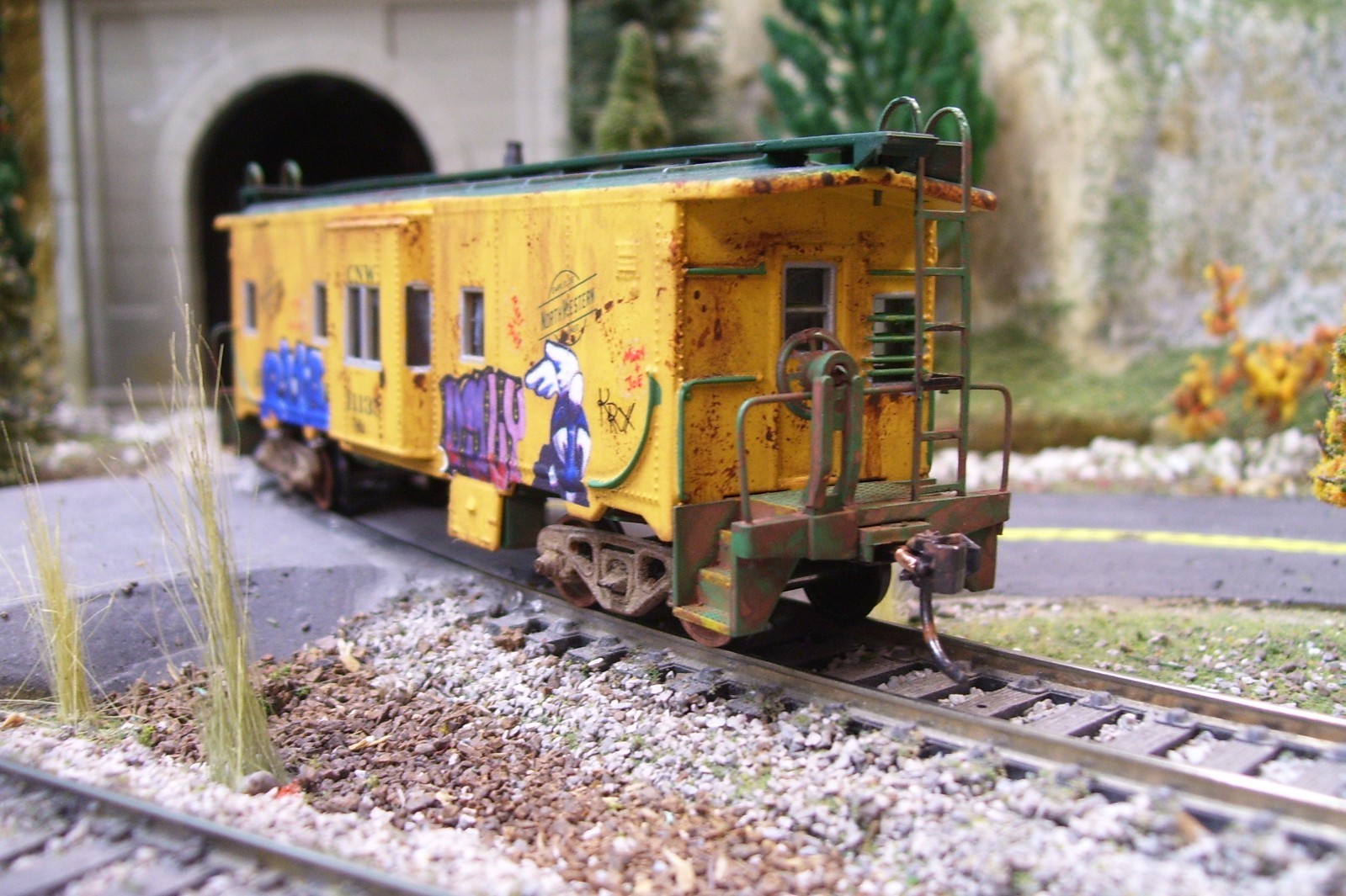 Custom Athearn Chicago &Northwestern bay window caboose.
