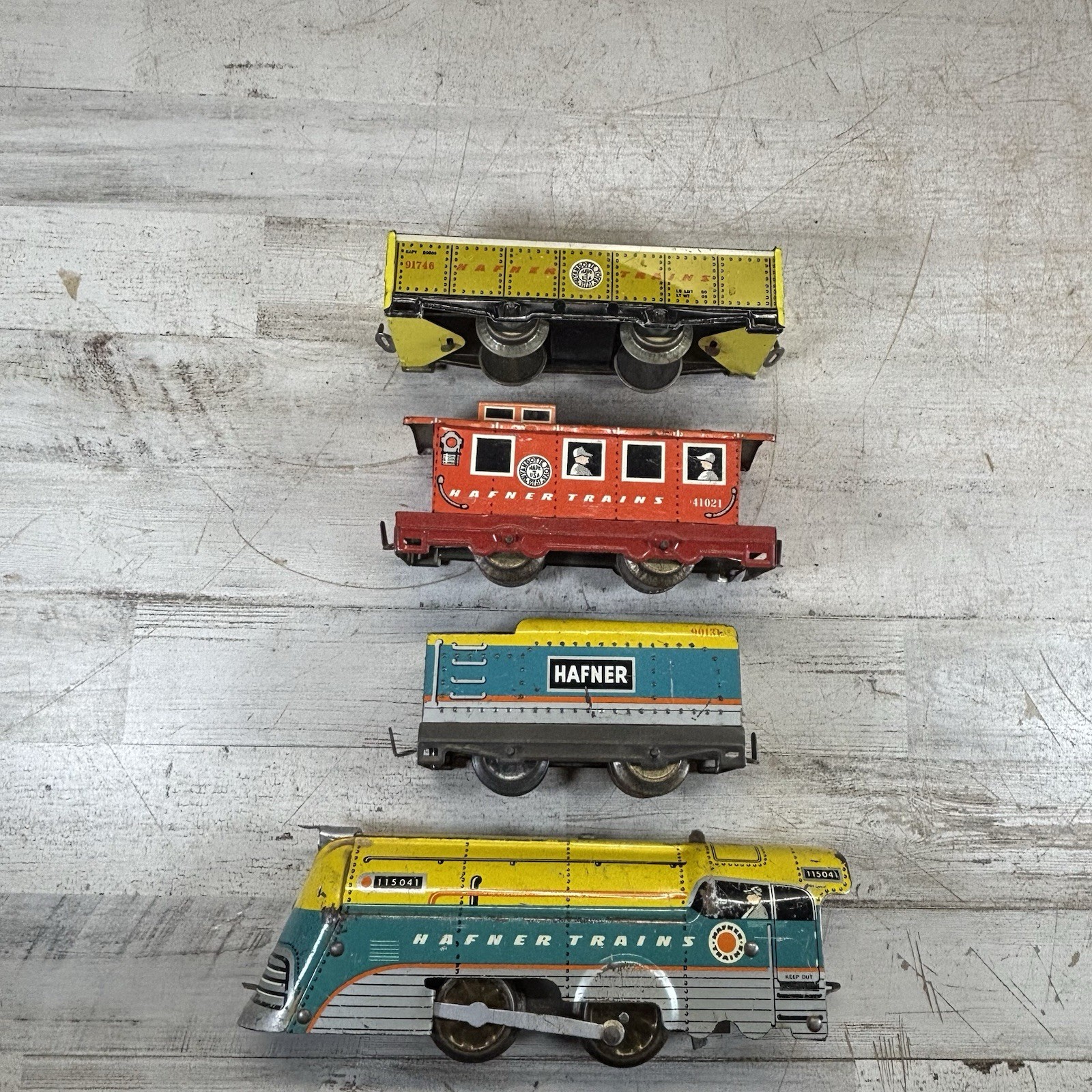 Hafner Prewar O Gauge Tin Litho Wind-Up Train Set Loco Caboose Tender Hopper 4Pc