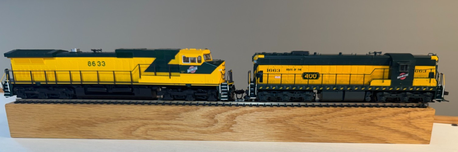Set of 2 CNW Diesel Locomotives with DCC Control – EMD SD-7 & GE DAsh9-44CW
