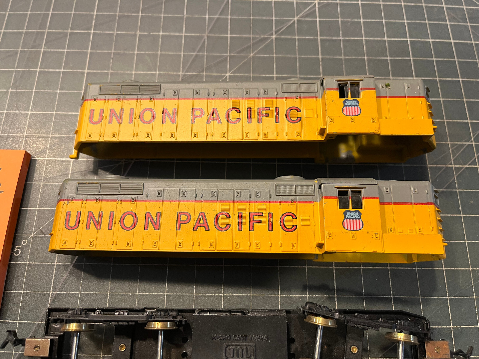 HO Train 2 UP DIESEL SHELLS & 1 STAMPED METAL MICRO CAST JAPAN FRAME PART LOT B