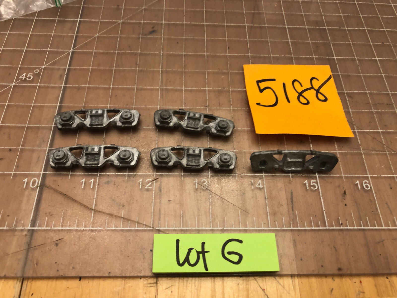 UNMARKED Brand of 5 CAST METAL TRAIN Side Truck Covers 5188 PART Lot G