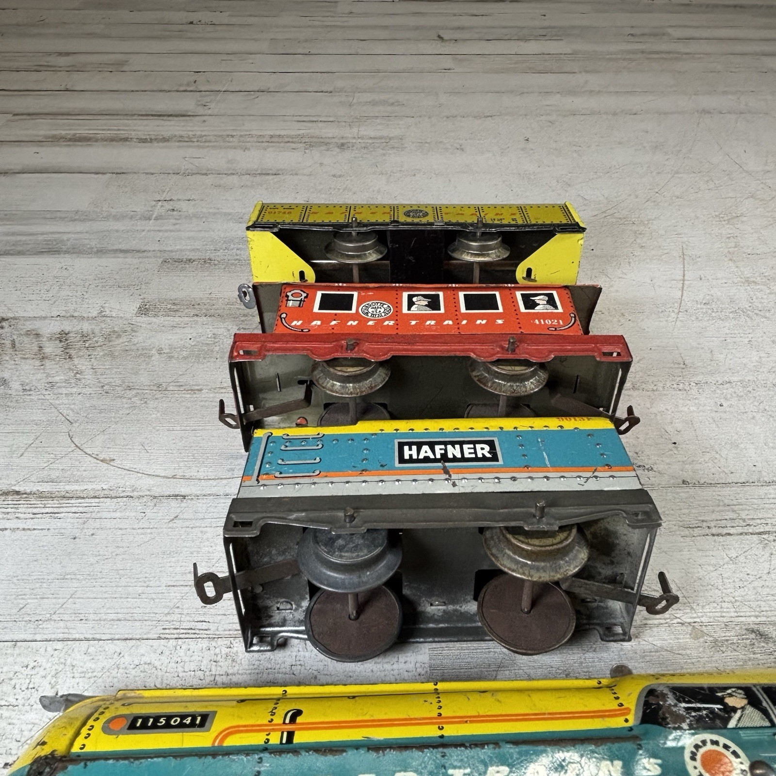 Hafner Prewar O Gauge Tin Litho Wind-Up Train Set Loco Caboose Tender Hopper 4Pc