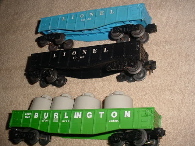 6- LIONEL GONDOLA CARS -NYC +BURLINGTON +REPUBLIC STEEL LIONEL 0-027 ga.