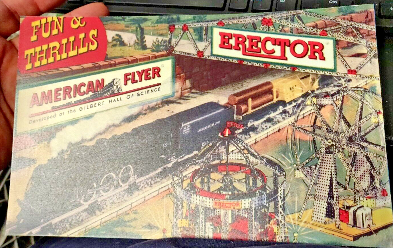 C 53 NEW 10 1/2 MANUAL SMILING BOY COVER PLANES, TRUCKS A.C.GILBERT ERECTOR SET