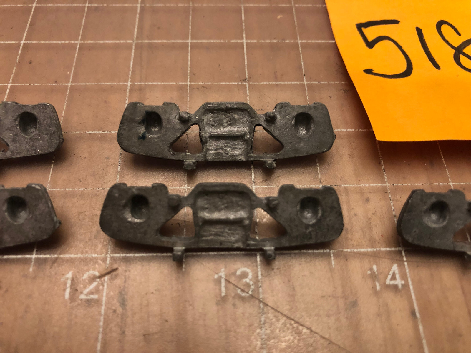 UNMARKED Brand of 5 CAST METAL TRAIN Side Truck Covers 5188 PART Lot G