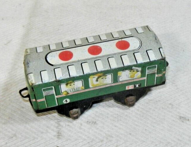 Older Tin Lithographed MT 4 Passenger Coach with plastic wheels – by who?