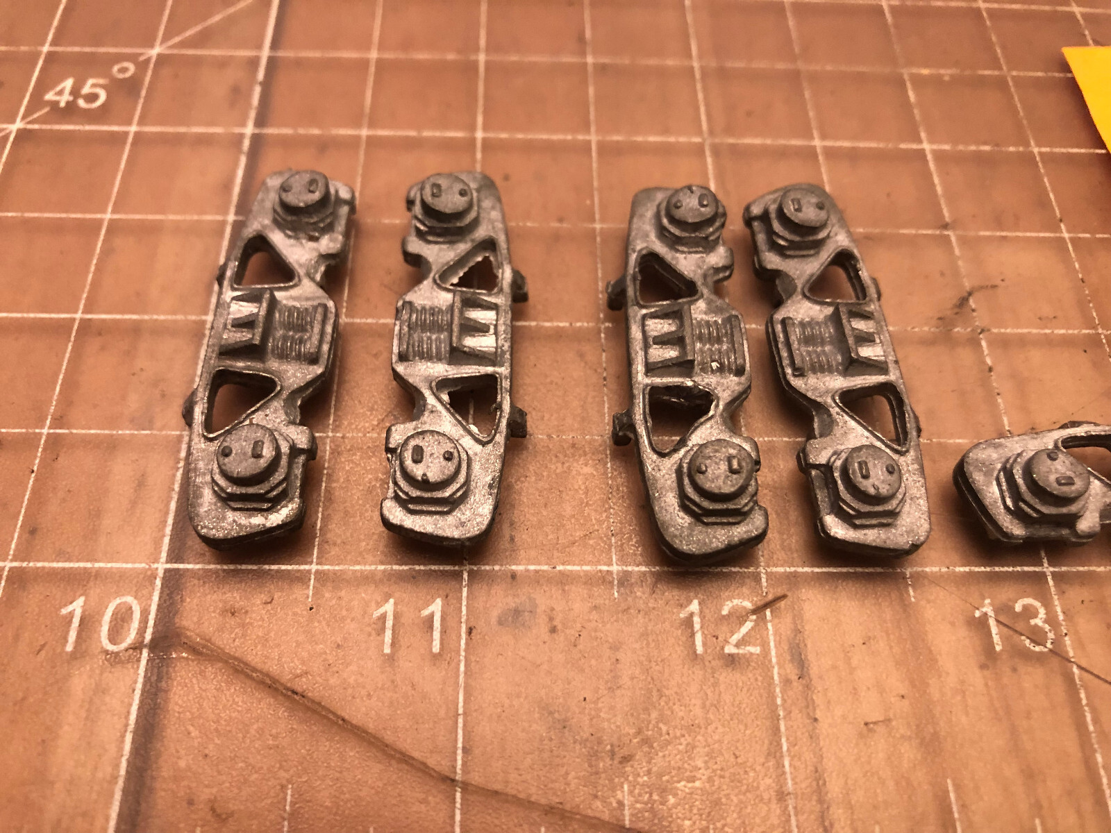 UNMARKED Brand of 5 CAST METAL TRAIN Side Truck Covers 5188 PART Lot G