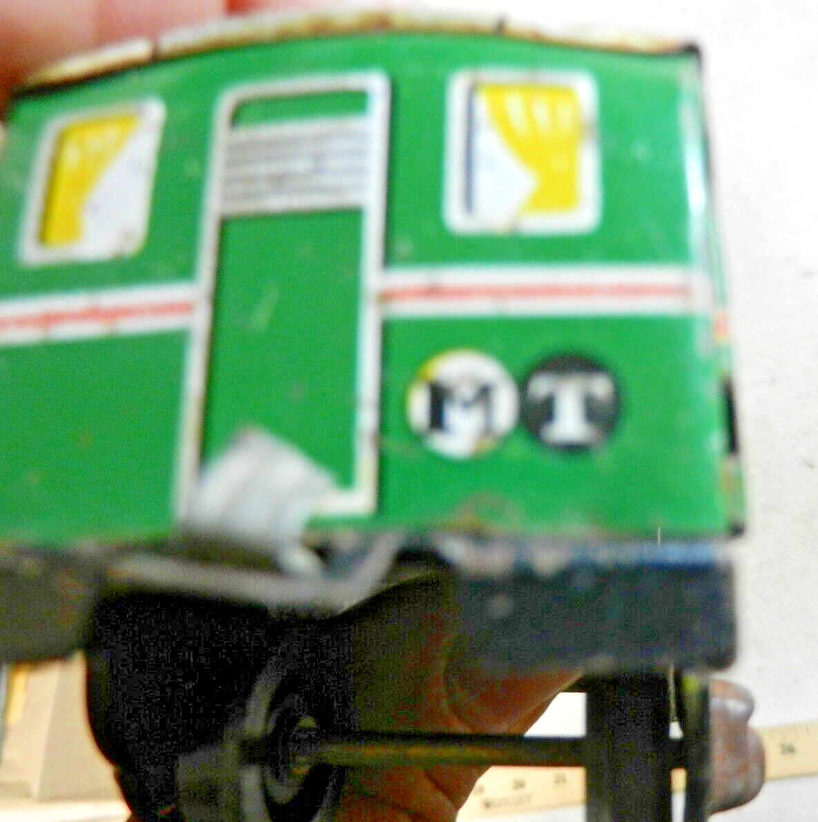 Older Tin Lithographed MT 4 Passenger Coach with plastic wheels – by who?